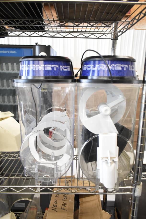 Industrial wire shelf with "Gourmet Ice" slushie machine hoppers, clear with white components, in good condition.