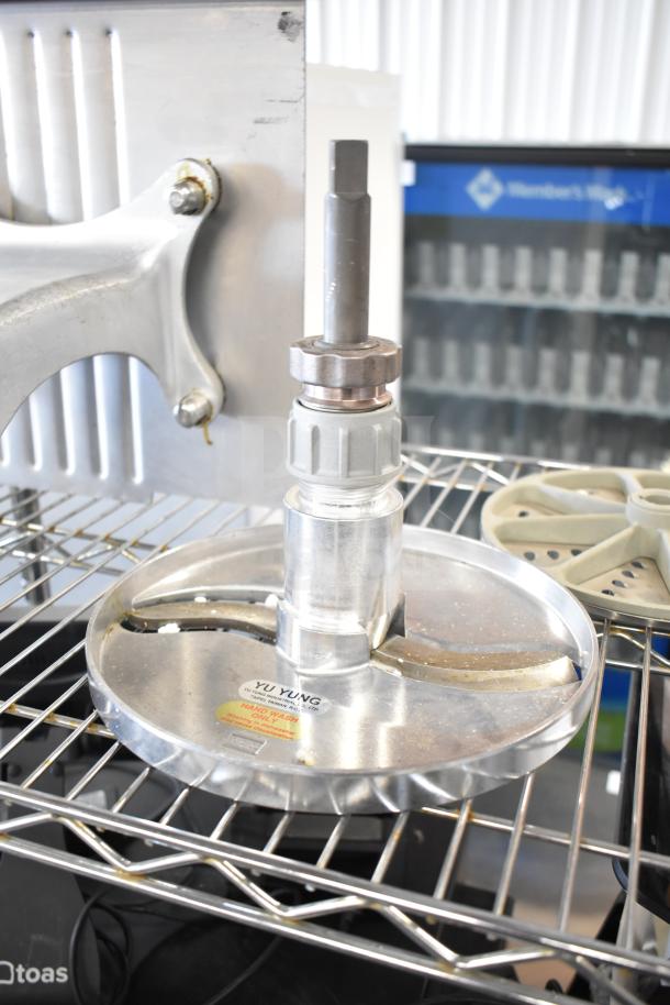 20 various kitchen equipment pieces including meat slicer arm and pelican head blades in used condition.