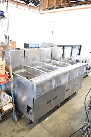 Pitco Frialator Commercial Natural Gas Powered 4 Bay Deep Fat Fryer on Commercial Casters. 122,000 BTU.