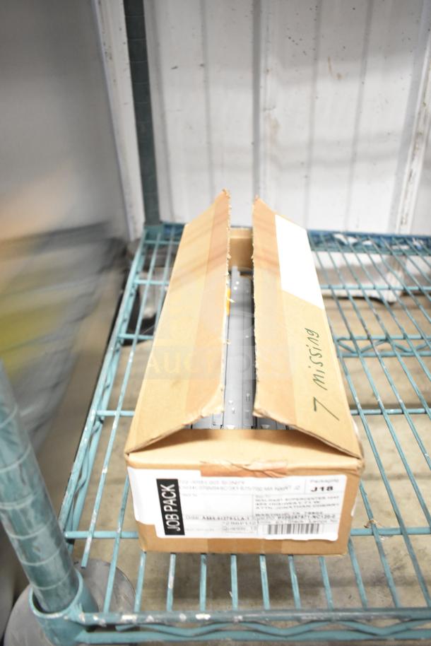 Box of brand new Advance LED Electronic Drivers, partially opened, labeled "7 missing," visible barcode and product details.