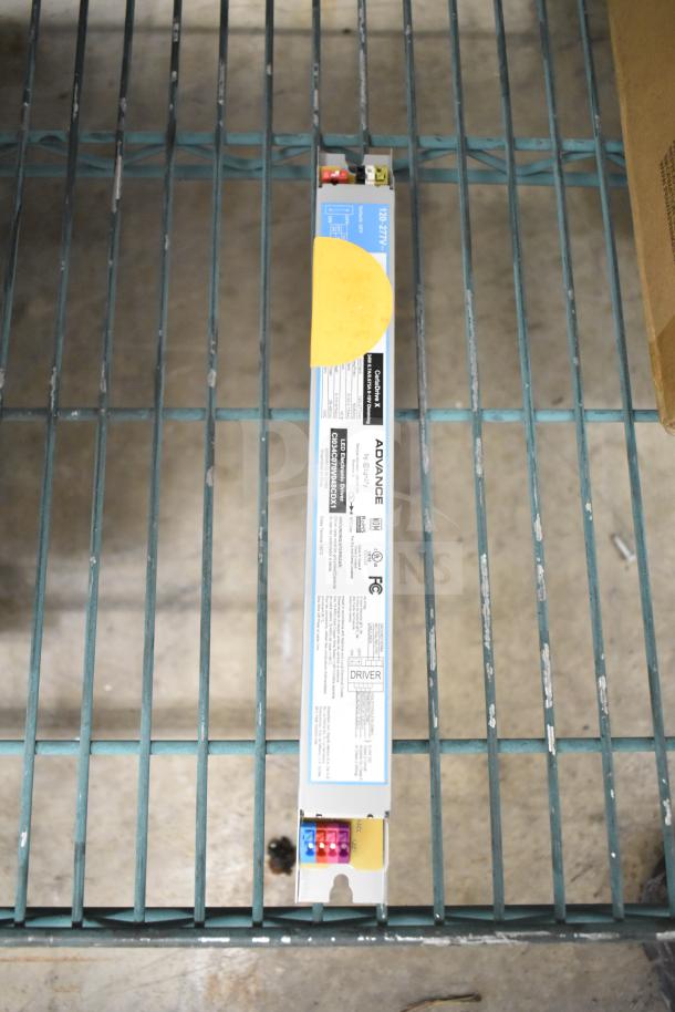 Box of brand new Advance LED electronic drivers, featuring model numbers and certifications on the label, in pristine condition.