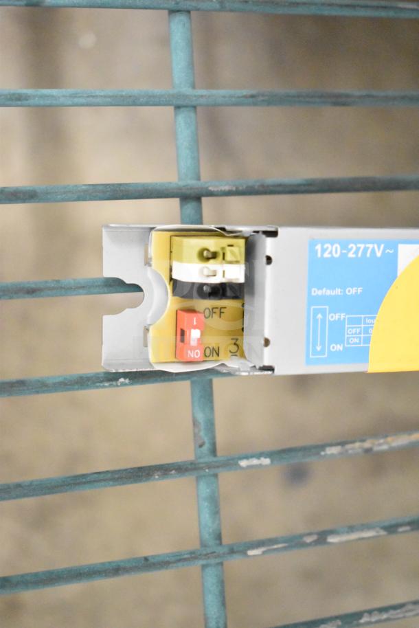 Box of brand new Advance LED Electronic Drivers, 120-277V, with clear ON/OFF switch labeled "Default: OFF."