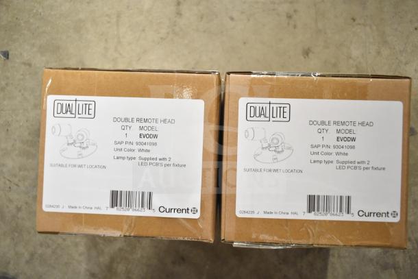 Box of DualLite EVODW Double Remote Head Light, brand new, model EVODW, white, suitable for wet locations.