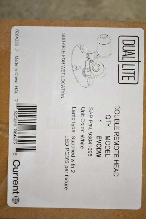Box of DualLite EVODW Double Remote Head Light, brand new, model EVODW, suitable for wet locations, white unit color.