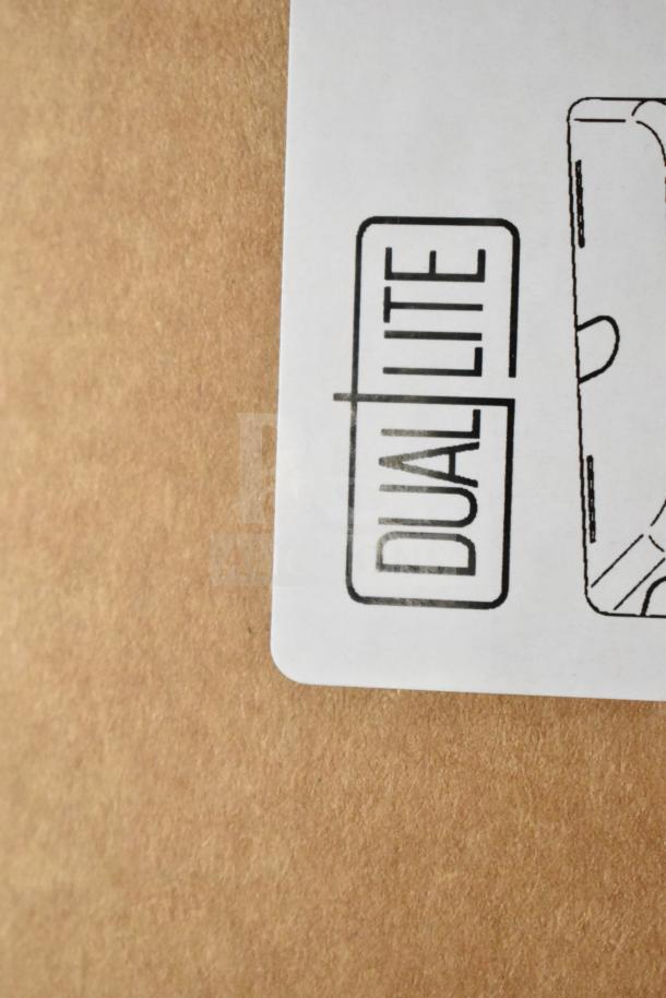 Brand new DualLite EVODW double remote head light in box. Visible DualLite logo on brown packaging.