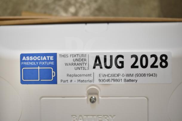 "Box of brand new DualLite EVODW Double Remote Head Light, warranty until Aug 2028, includes battery replacement info."
