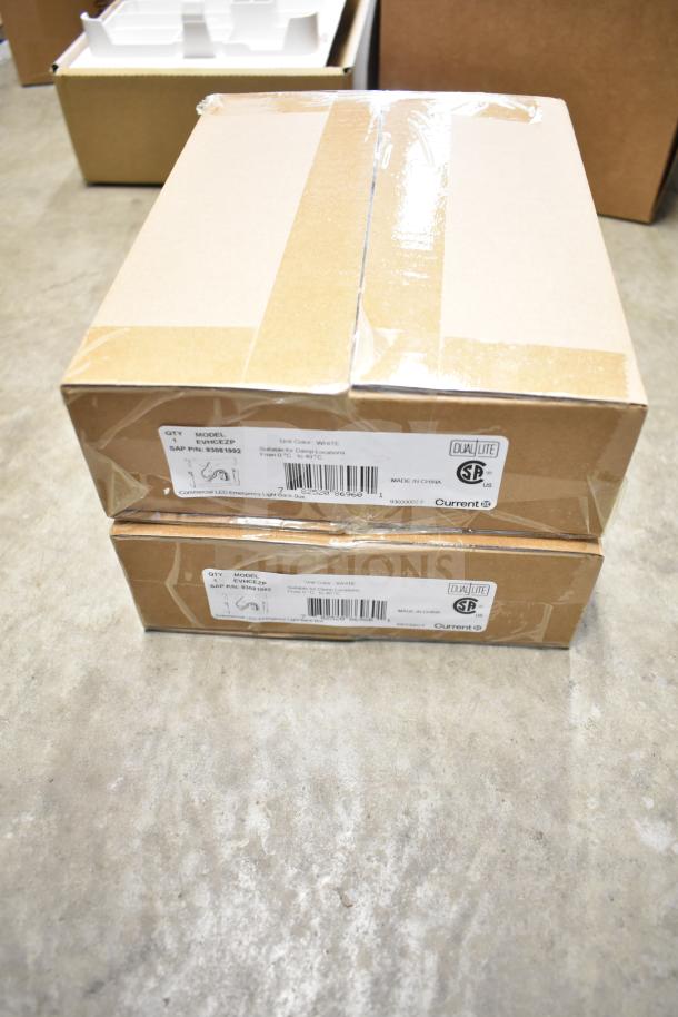 Brand new DualLite EVODW Double Remote Head Light box. Sealed packaging with labels indicating model EVWC1EZP.