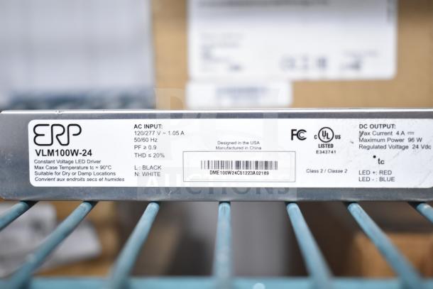 "11 boxes of new DualLite EVODW Double Remote Head Light, EBP Ballasts, DualLite DYN6I-WM; ERP LED driver label shown."