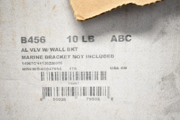 Label on packaging for Sentry Fire Extinguisher, B456 model, 10 LB, ABC, with wall bracket but no marine bracket included.