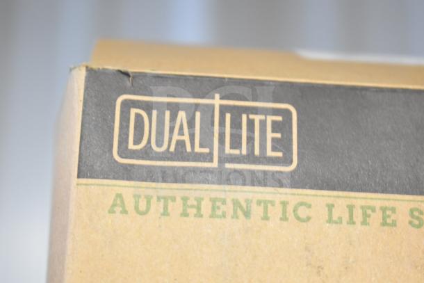 "Dual Lite" branded emergency light box, featuring marked "Authentic Life Safety" text.