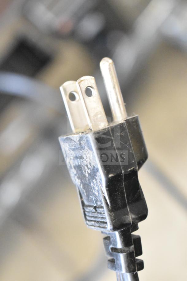 Close-up of a two-prong power plug for the Sharp Carousel R-3A47 Microwave, 120 Volts, highlighting condition and wear.