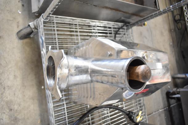 Avantco MG22 commercial countertop meat grinder, stainless steel, 110V, 1 phase; shows slight wear, suitable for heavy use.