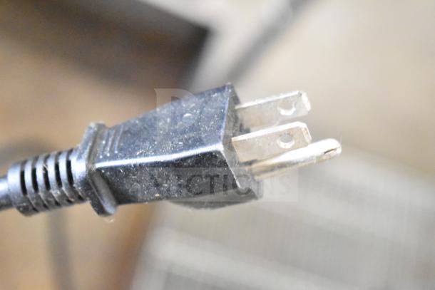 Close-up of Avantco MG22 meat grinder plug, showing standard 110V, 1 phase connection. Ideal for commercial use.