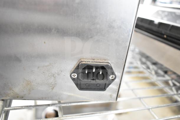 VacPak-It 186VME16SS vacuum packaging machine, stainless steel, visible power connector, 16" seal bar, 120V, used condition.