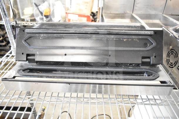 VacPak-It 186VME16SS external vacuum packaging machine with 16" seal bar, 120 volts, metal finish, visible wear signs.