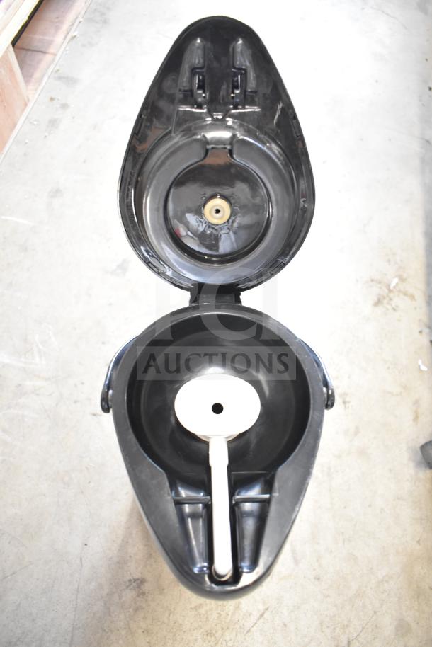 Black air pot with open lid, showing interior mechanism. In good condition, part of a set of three up for auction.