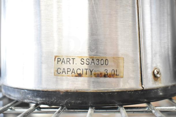 Stainless steel air pot, part SSA300, 3.0L capacity, visible wear, label shows specifications.