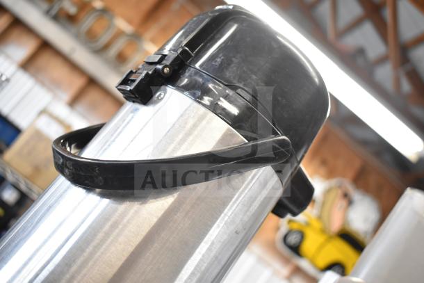 Three stainless steel air pots, featuring black lids and handles, in good condition. Multiples of the same item.