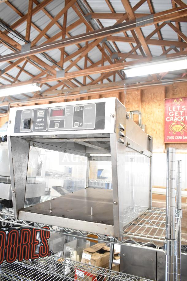Henny Penny MW 1 commercial countertop display food warmer, stainless steel, 120 volts, 1 phase, control panel visible.