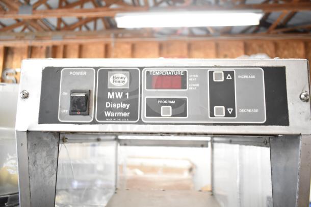 Henny Penny MW 1 Commercial Display Food Warmer, 120V, 1 Phase. Control panel and power switch visible, some surface wear.