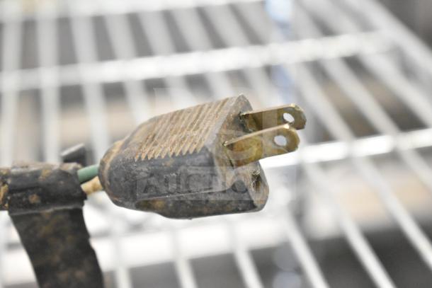 Rusty power plug for Henny Penny MW 1 display food warmer, indicating moderate wear and potential need for replacement.