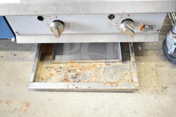 Cooking Performance Group 351GTCPG24 gas griddle with flame failure protection, thermostatic controls; visible wear and rust.