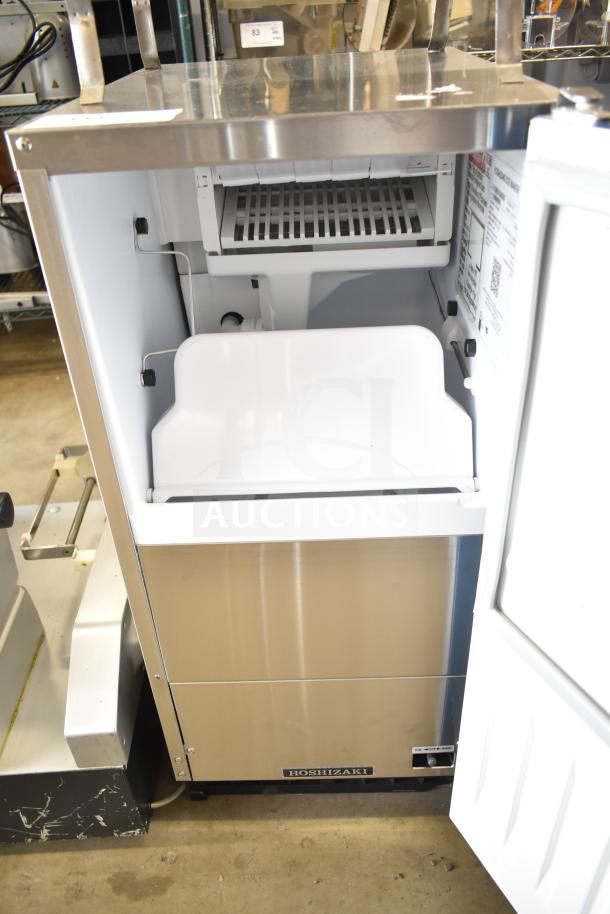 2025 Hoshizaki AM-50BAK-DS Top Hat Ice Machine, 115V, 1 Phase, new scratch and dent, stainless steel finish, interior view.