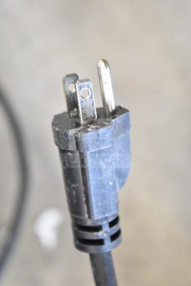 Close-up of the plug for the 2023 Crosson CPO-320 countertop electric pizza oven, model CPO-320.