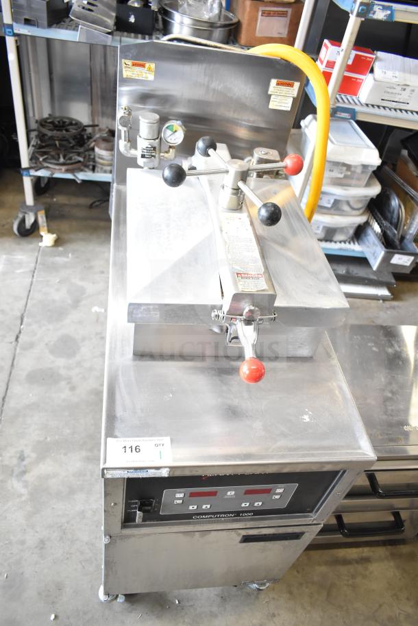 2022 Henny Penny 600 commercial pressure fryer, natural gas, 80,000 BTU, floor style, on casters, with control panel.