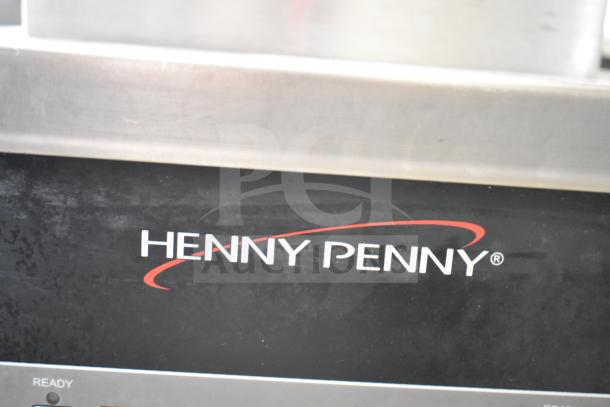 2022 Henny Penny 600 commercial gas pressure fryer, 80,000 BTU, floor style, on casters, logo label visible.