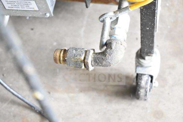 2022 Henny Penny 600 pressure fryer gas connection on caster wheel, used condition, natural gas powered, 80,000 BTU.