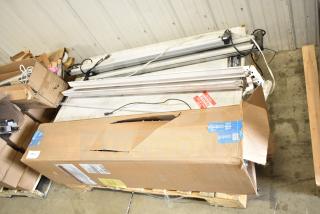 Cardboard box containing Philips tube lights and PT44070 2x4 LED Light Panel. Six items total. Box shows wear.