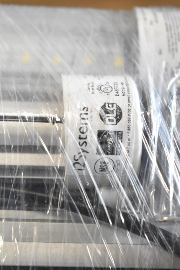 6 items wrapped in plastic, includes Philips tube lights and PT44070 2x4 LED panel. Features UL and DLC labels.