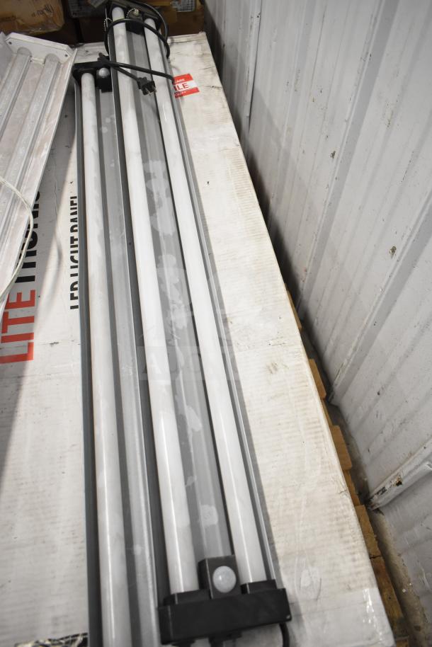 6 various items including Philips tube lights on box. Featured: PT44070 2x4 LED light panel, cords attached.