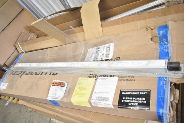 Cardboard boxes containing i2Systems light strips, visible labels, some packaging wear. 20 items for auction lot.