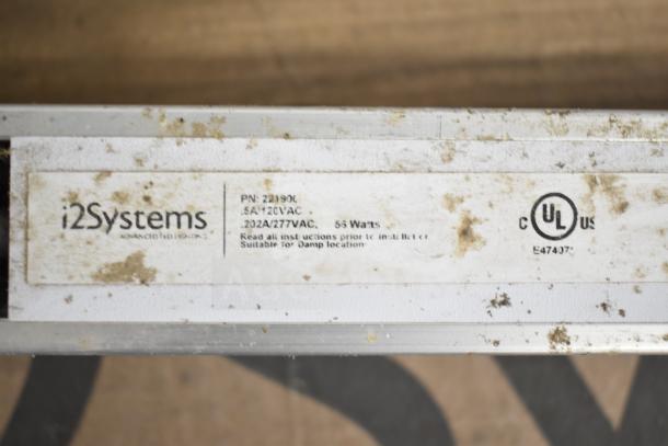 Dirty i2Systems label on light strip, part number 22190L, 55 Watts, suitable for damp locations, UL certified.