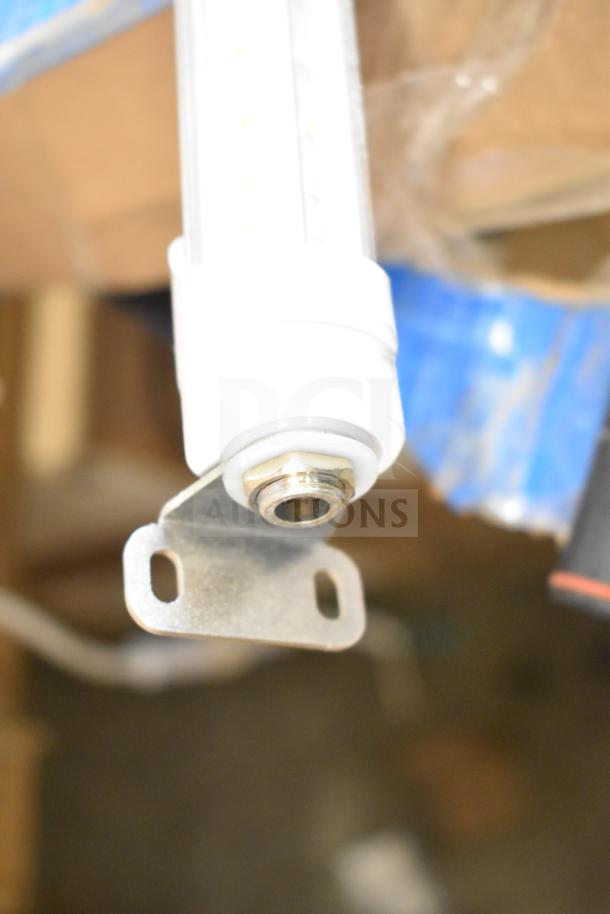 Close-up of a light strip attachment, possibly part of i2Systems set; includes mounting bracket, unclear overall condition.