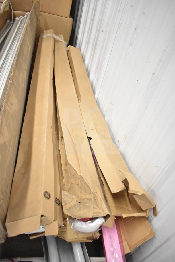 20 various items including i2Systems light strips in cardboard boxes, some wear visible, bulk auction lot.