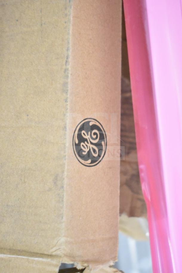 Cardboard box with GE logo, part of 20-item auction including i2Systems light strips.