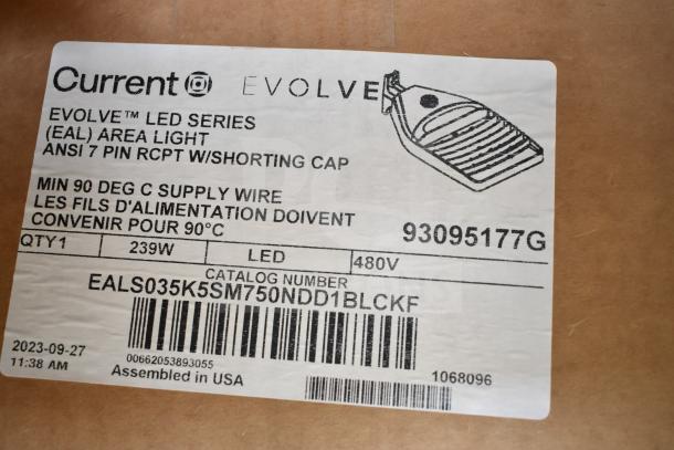 Label of GE Evolve LED Area Light, model EALS035K5SM750NDD1BLCKF, 239W, 480V, assembled in the USA.