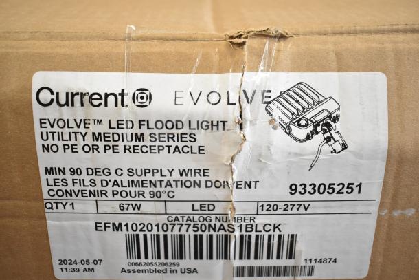 Cardboard box with label for Current Evolve LED Flood Light, Utility Medium Series, 67W, 120-277V, catalog EFM1020107750NAS1BLCK.