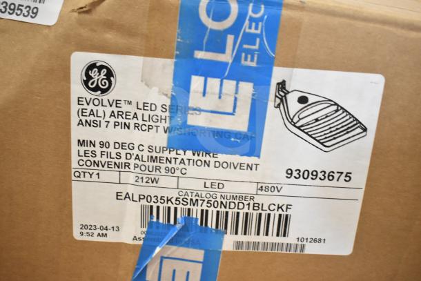 GE Evolve LED Series Area Light, 212W, 480V, model EALP035K5SM750NDD1BLCKF, with ANSI 7 pin. Box tag visible.