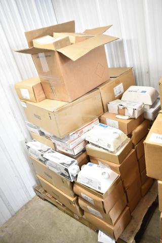Boxes of brand new items including DualLite EVODW Double Remote Head and DualLite Exit Sign. 50 times your bid offer.