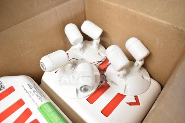 Box of 50 brand new items including DualLite EVODW double remote heads and DualLite exit signs.