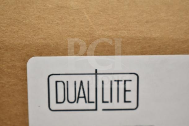Box with DualLite logo, indicating brand new items including DualLite EVODW Double Remote Head and Exit Sign.