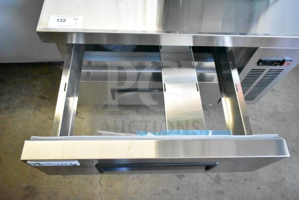 Brand new 2025 Avantco 178CBE36HC 2-drawer refrigerated chef base on commercial casters, 115 Volts, 1 Phase. Some scratches.