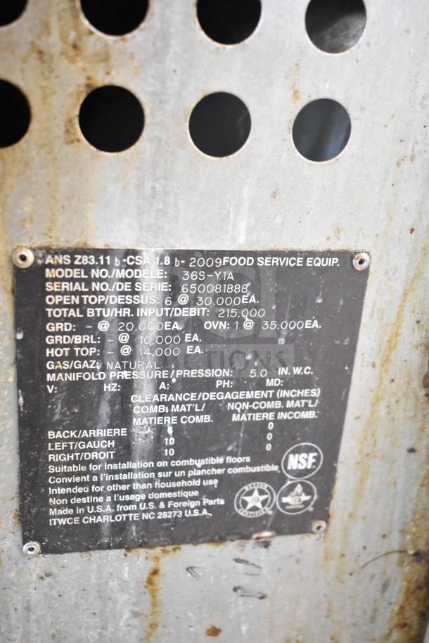 Vulcan 36S-Y1A commercial gas range serial number plate, showing NSF certification and specs: 215,000 BTU, 6 burners.