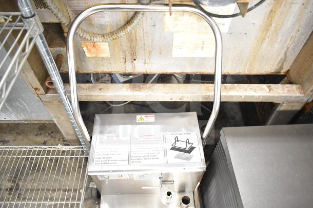 BRAND NEW Fryclone 259OFM55 55 lb. fryer oil filter with 2-way pump, 120V, 1 Phase. Labels show operating instructions.