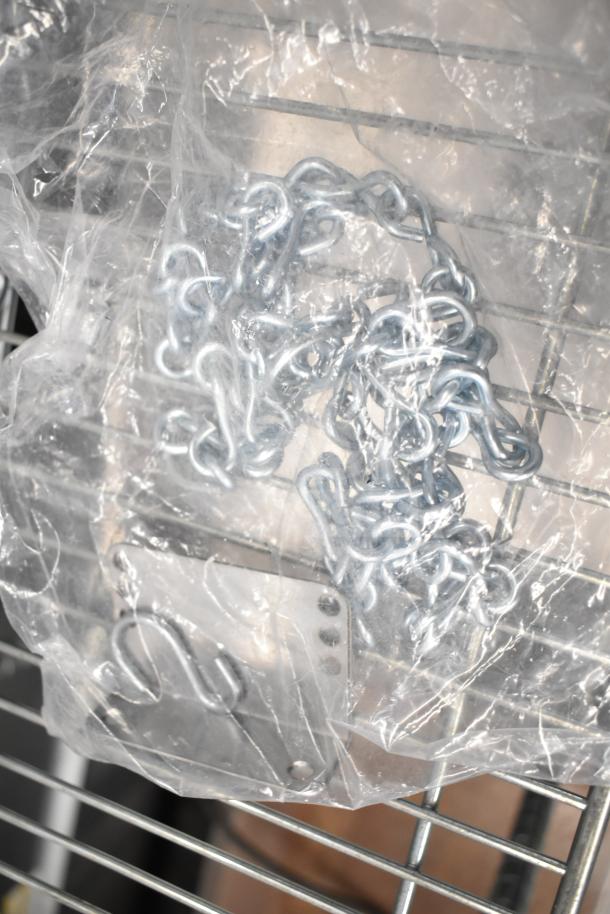 Vollrath Cayenne Light Strip in packaging, includes metal chain and mounting hardware, sealed in plastic for protection.