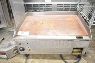 Countertop electric flat top griddle, 208 volts, 1 phase, with visible rust and wear on the cooking surface, auction lot 137.